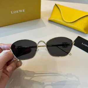 Loewe sunglasses gold metal frame black lenses luxury eyewear with yellow leather case and branded box