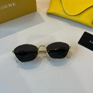 Loewe sunglasses black lenses gold metal frame lightweight fashion accessory