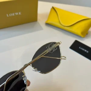 Loewe sunglasses gold metal frame black lenses luxury designer eyewear with logo detail