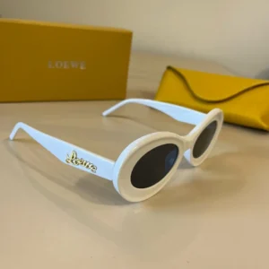 Loewe sunglasses white acetate oval frame black lenses with gold logo detailing