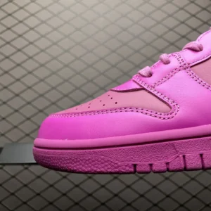 Nike Dunk Low Pinkberry pink leather sneakers with perforated toe and textured sole