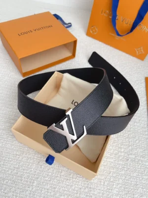 Louis Vuitton men's palm print belt with stainless steel buckle, displayed in box with branded packaging.