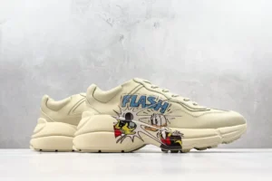 Gucci Rhyton Flash beige leather sneakers with Donald Duck comic graphic and chunky sole