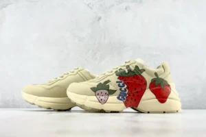 Gucci Rhyton sneakers beige leather with colorful strawberry print and Gucci logo detail