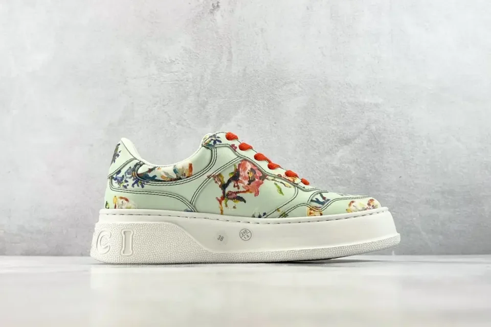 Gucci Flashtrek sneaker floral multicolor leather upper orange laces low-top shoe