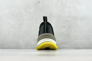 Nike React Infinity Run Flyknit black grey yellow textile sneakers rear view