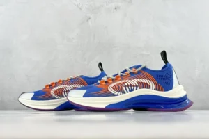 Nike Air Max 270 React ENG blue orange white knit sneakers with foam sole and rubber outsole