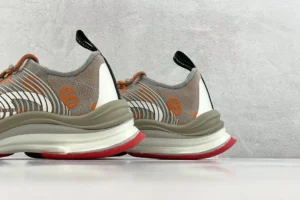 Gucci Rhyton 551203 gray orange knit fabric sneakers with red white sole and black pull tab