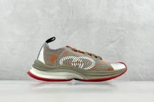 Gucci Cosmic Duffle scaffolding beige orange red knit sneakers with rubber sole and reflective details