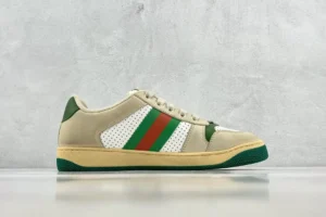 Stylish sneaker with green and orange stripes