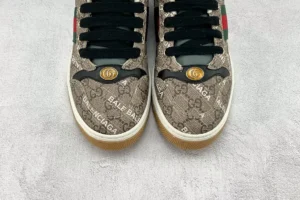 Gucci Screener Distressed Leather sneakers featuring signature logo print and contrasting colors, displayed on a textured surface, relevant to luxury fashion replica listing.