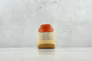 Gucci sneakers off-white orange leather heel tab cream rubber sole casual footwear
