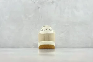 Gucci Screener Series GG Enamel used sneakers showing the back view with logo detail on a neutral background.