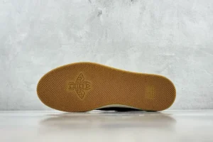 Gucci Screener Series GG Enamel used sneaker sole with gum rubber bottom and textured surface.