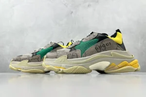 Gucci x Balenciaga Triple S Card sneakers in gray, green, and yellow, showcasing luxury design and unique color accents.