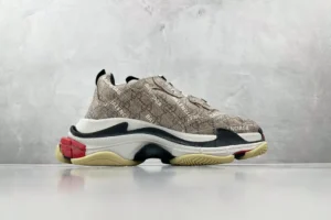 Gucci x Balenciaga Parisian Family Triple S Brown replica sneakers featuring a distinctive patterned upper, thick sole, and contrasting color accents, displayed on a neutral background.