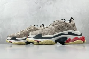 Gucci x Balenciaga Parisian Family Triple S Brown sneakers featuring a textured design, logo detail, and distinctive sole, showcased for e-commerce listing.