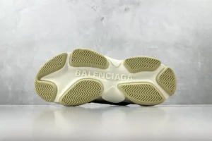 Balenciaga Triple S beige sole chunky sneaker with rubber grip and embossed brand logo outsole