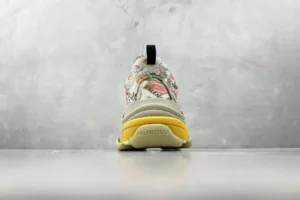 Balenciaga Triple S sneaker multicolor floral print leather upper yellow sole sneakers