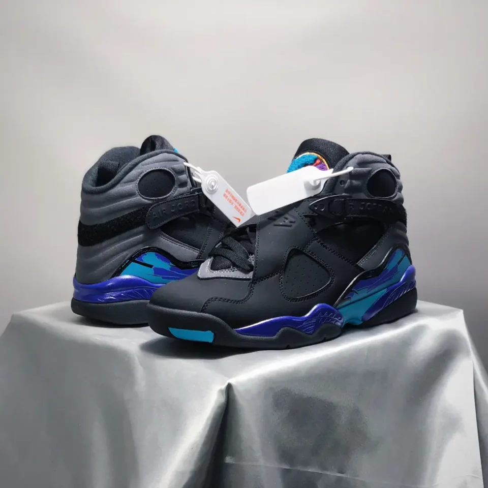 Nike Air Jordan 8 Retro black blue turquoise leather sneakers with velcro straps and multicolor accents