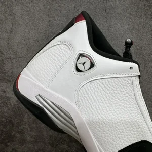 Nike Air Jordan 14 Retro white red black leather basketball sneakers with metallic details