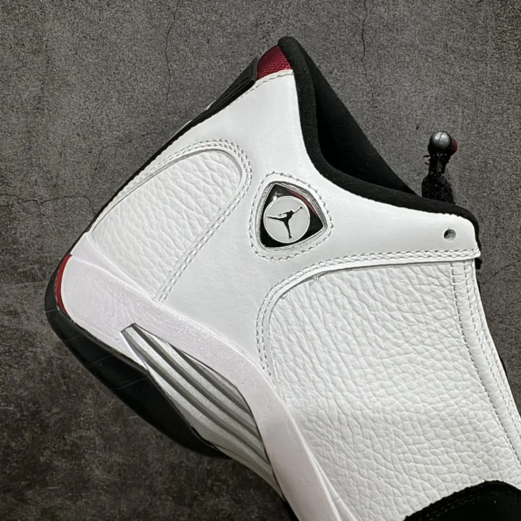 Nike Air Jordan 14 Retro white red black leather basketball sneakers with metallic details