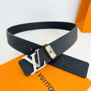 Louis Vuitton Damier Signature reversible black leather belt with silver LV buckle and gold accent nameplate