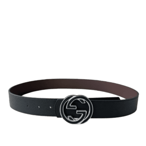 Gucci belt featuring interlocking double G buckle, crafted from grey cowhide on the front and black cowhide on the back, showcasing versatility and luxury design.