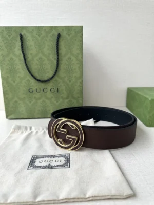 Gucci belt brown leather double G gold buckle luxury accessory with branded packaging and cloth pouch