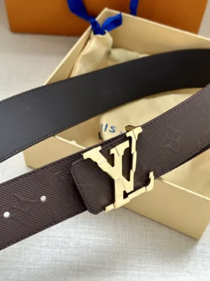 4.0-wide LV Shadow belt with Monogram featuring a gold LV buckle, placed in a gift box with a beige interior.