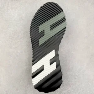 Sole of Hermes Men’s Bouncing Sneaker featuring textured design and contrasting colors, highlighting luxury footwear craftsmanship.