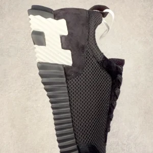 Hermes Men’s Bouncing Sneaker in technical mesh with a textured outsole and sleek design, showcasing luxury footwear features for replica shoe enthusiasts.