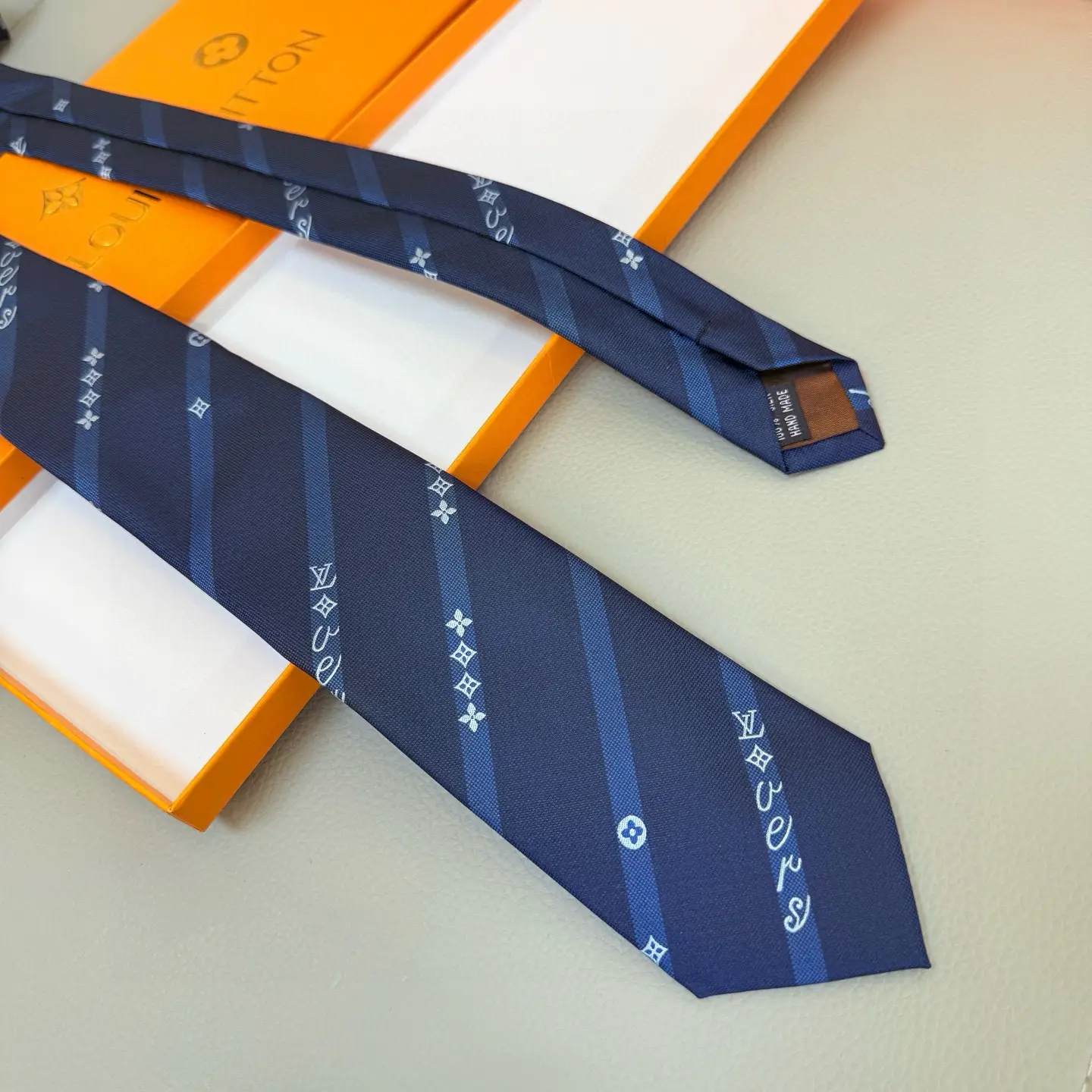 Louis Vuitton necktie blue silk with monogram pattern and diagonal stripes accessory