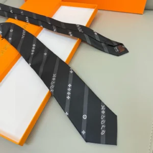 Silk LV tie featuring diagonal stripes with LVVers logo and Monogram flowers, displayed on a light surface with an orange box.