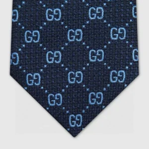 Gucci tie navy blue silk with light blue GG logo pattern luxury accessory