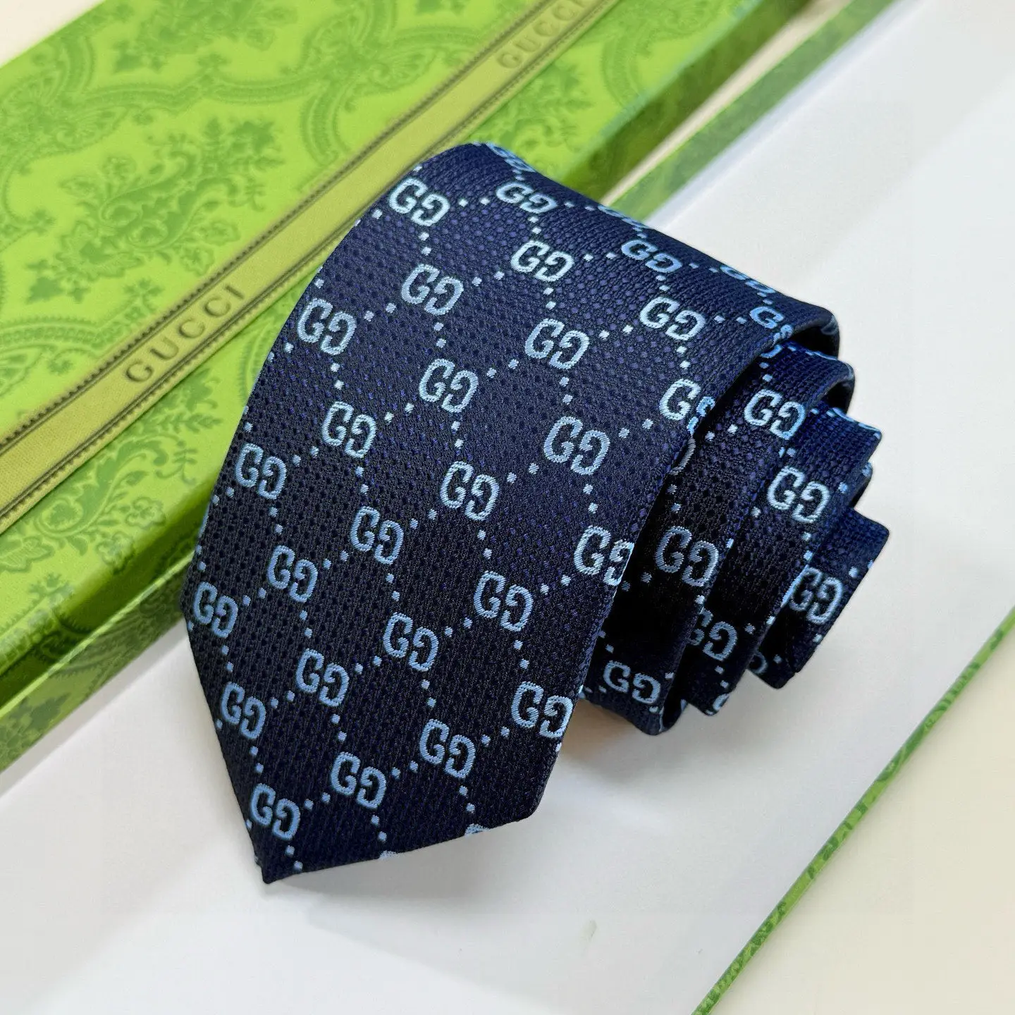 Gucci men's tie navy blue silk with light blue GG pattern luxury accessory