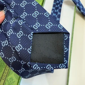 Gucci silk tie navy blue GG pattern luxury men's accessory with signature logo lining