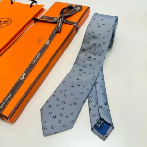 Hermes tie light blue silk with horseshoe pattern luxury men's accessory gift box