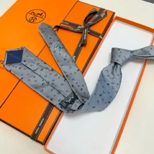 Hermes silk tie gray with black horseshoe pattern luxury men's accessory in orange box