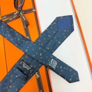 Hermes tie blue silk with horseshoe and horse print luxury men's accessory