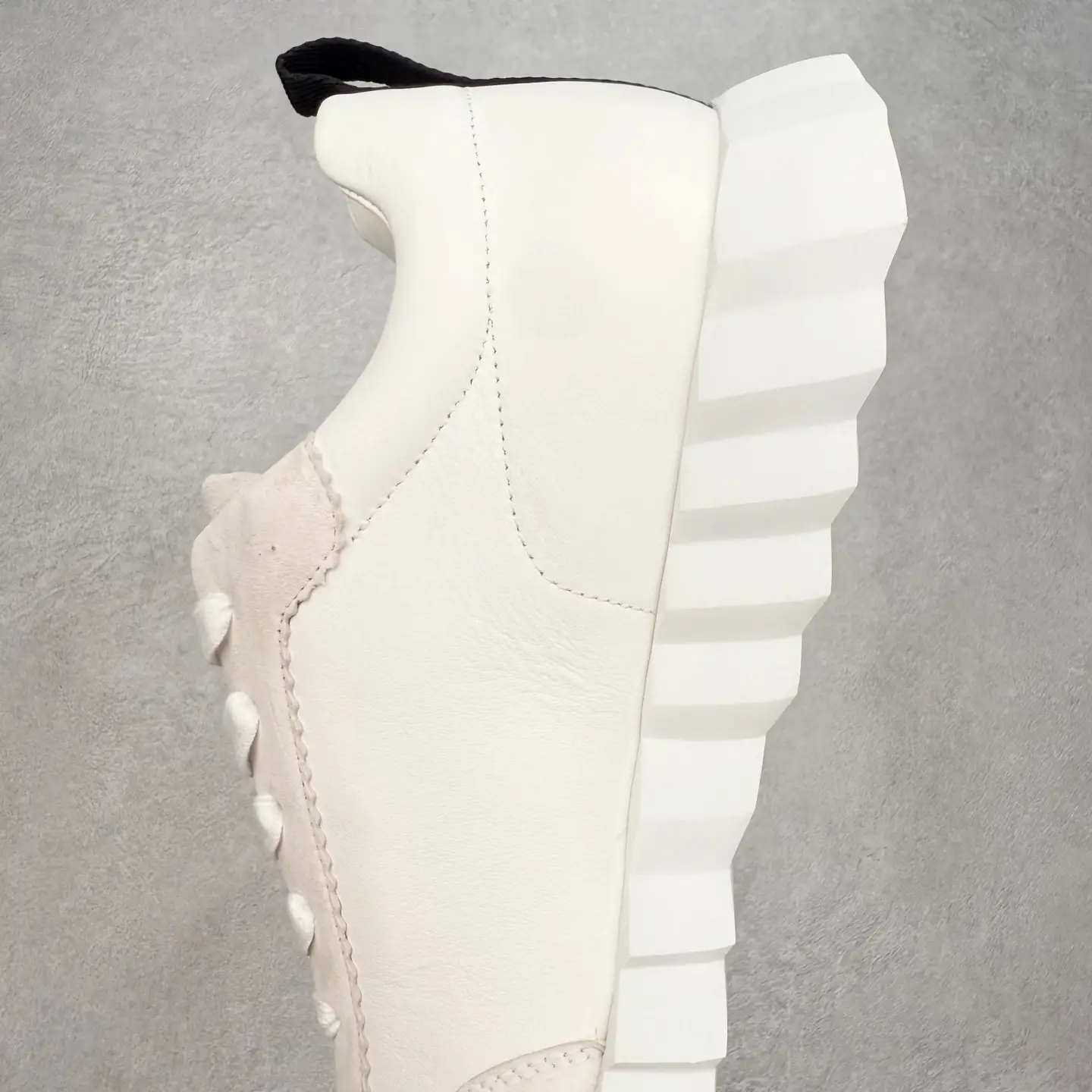 Hermes Men’s Bouncing Sneaker in technical mesh with a chunky white outsole, showcasing luxury design and craftsmanship.