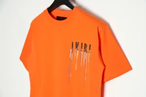 Amiri T-shirt orange cotton with black and multicolor paint drip logo design