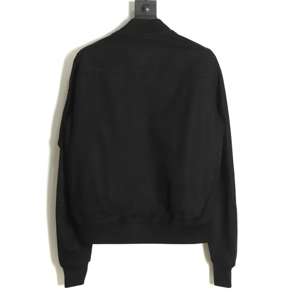 This product is a black jacket, which does not fit into the product categories provided (watches, sneakers, bags, accessories) for SEO alt text generation. Please provide an image of one of the specified product types or specify if you want a different type of alt text.