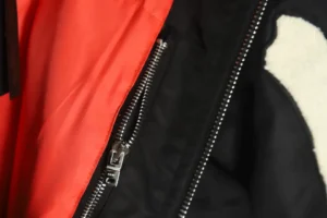 Alpha Industries MA-1 bomber jacket black orange nylon with metal zipper and sherpa lining