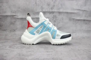 Alexander McQueen Tread Slick sneakers white red blue leather with chunky sole and lace-up design
