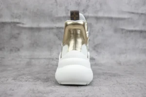 Louis Vuitton Archlight sneaker metallic gold white leather chunky sole luxury footwear