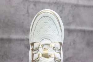 Louis Vuitton Archlight sneaker white gold leather embossed monogram upper