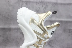 Louis Vuitton Archlight sneaker white gold leather embossed monogram sneakers