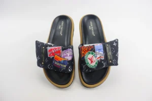 Louis Vuitton Velcro slippers featuring a floral fabric design, thick soles, and decorative patches, showcasing a couple's style for Spring/Summer 2024 collection.