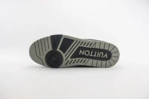 Louis Vuitton Trainer low-cut shoe sole featuring the brand logo, showcasing detailed design and construction elements.